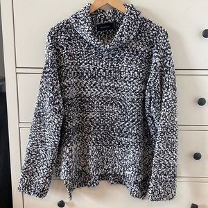 Black and white boucle turtleneck sweater